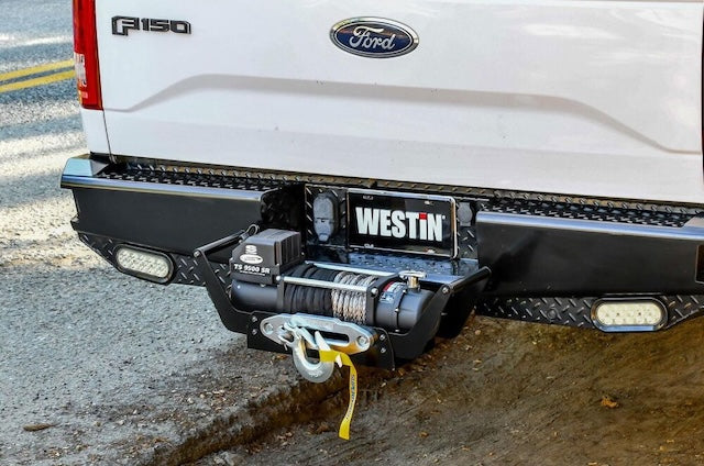 Front and rear mounted winches
